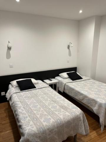 Quarto Twin com Casa de Banho Privativa