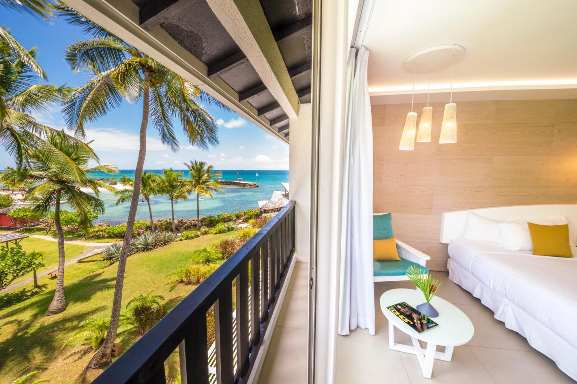 Kamer met 2 Tweepersoonsbedden en Uitzicht op Zee