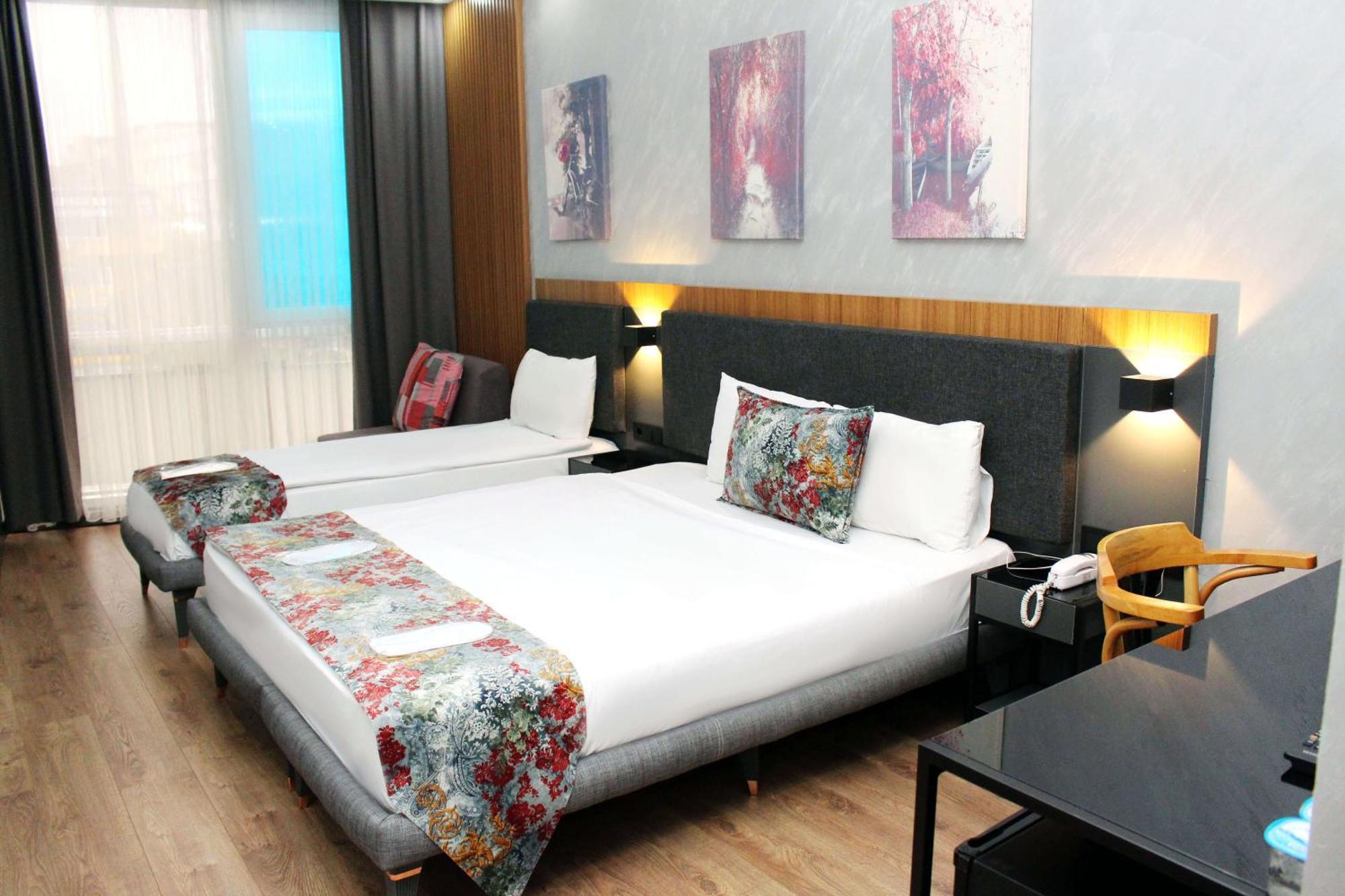 Deluxe Triple Room,1330666670:JPEG
