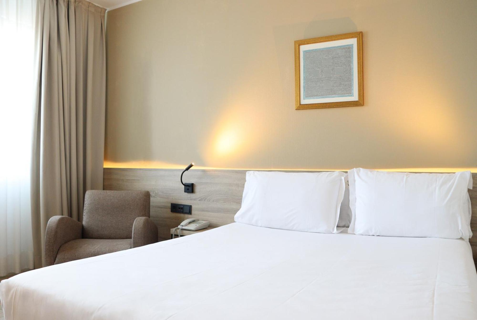 Quarto Standard com Cama de Casal ou 2 de Solteiro