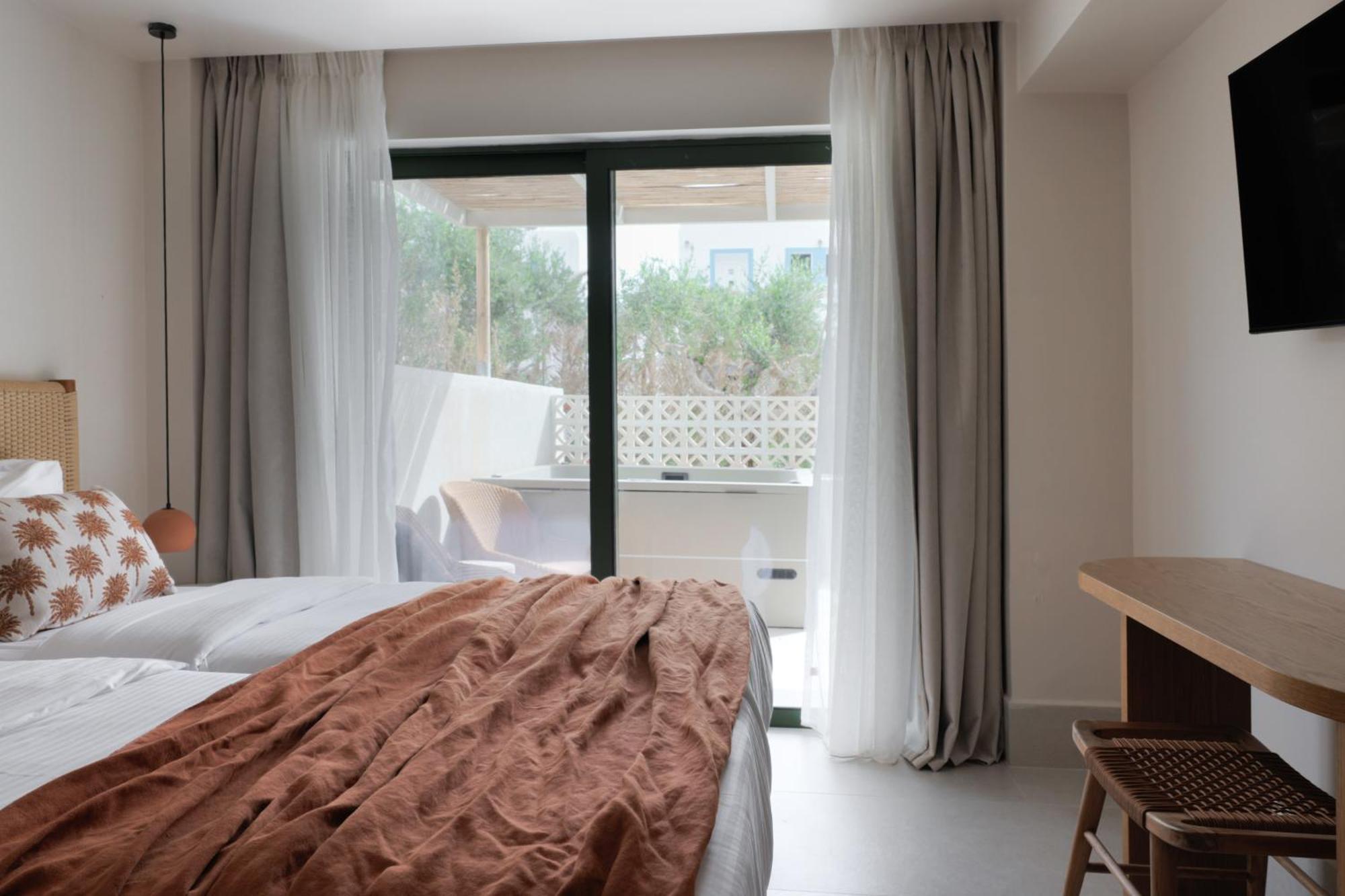 Junior Suite with Open Air Hot Tub and Garden View