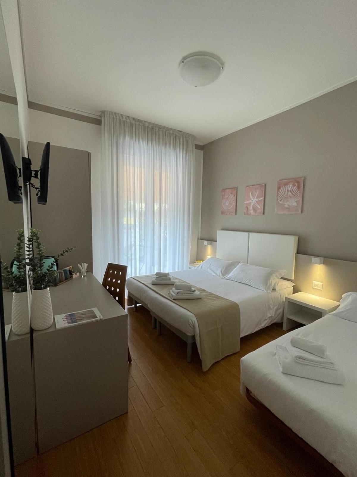 Chambre Triple avec Terrasse