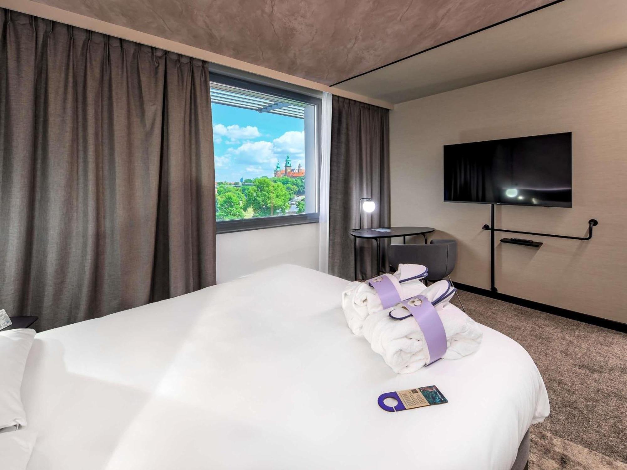 Suite Junior con cama grande y sofá cama