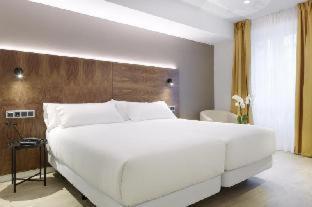 Habitación Doble Deluxe con cama supletoria