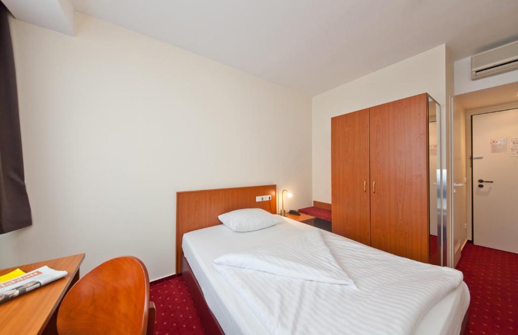 Einzelzimmer mit Queensize-Bett