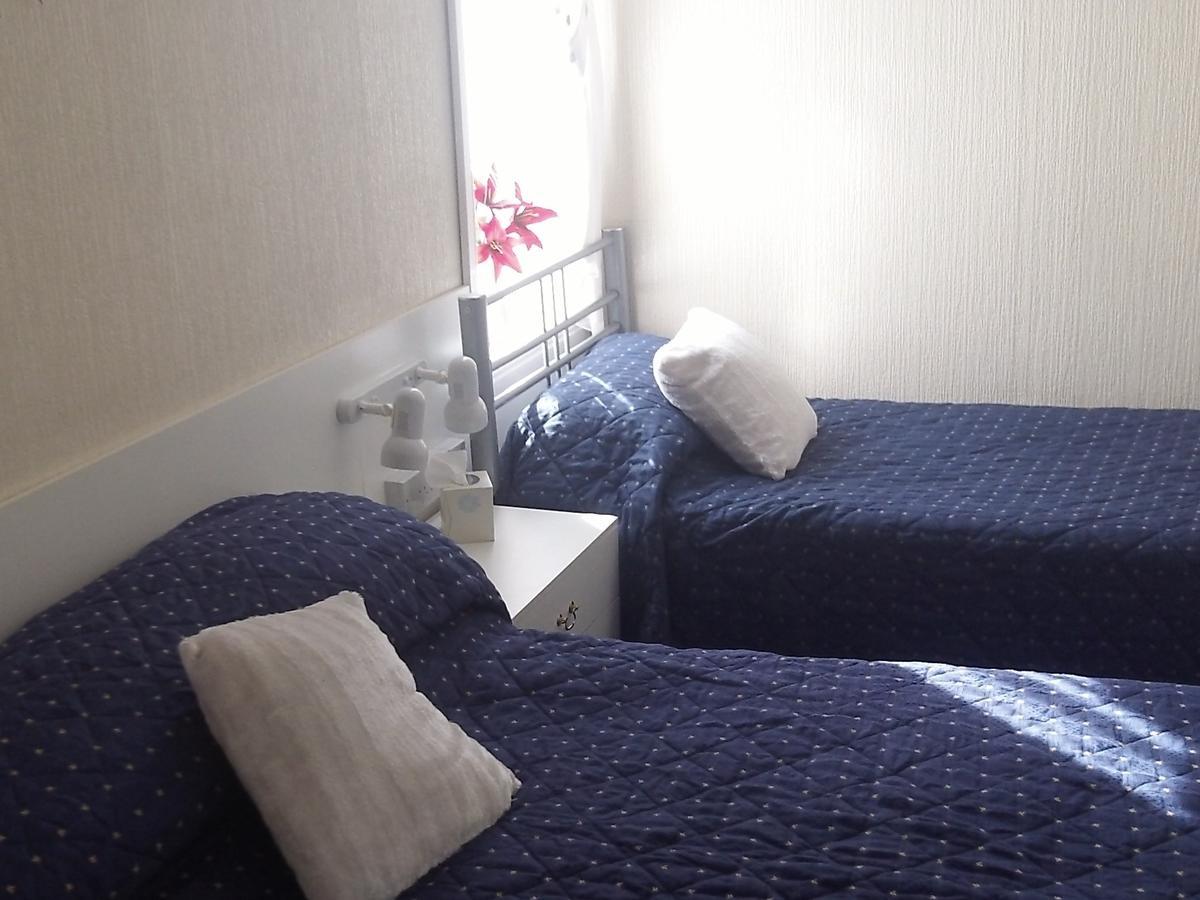 Twin room / Small Family Room (2 Adults + 1 Child)