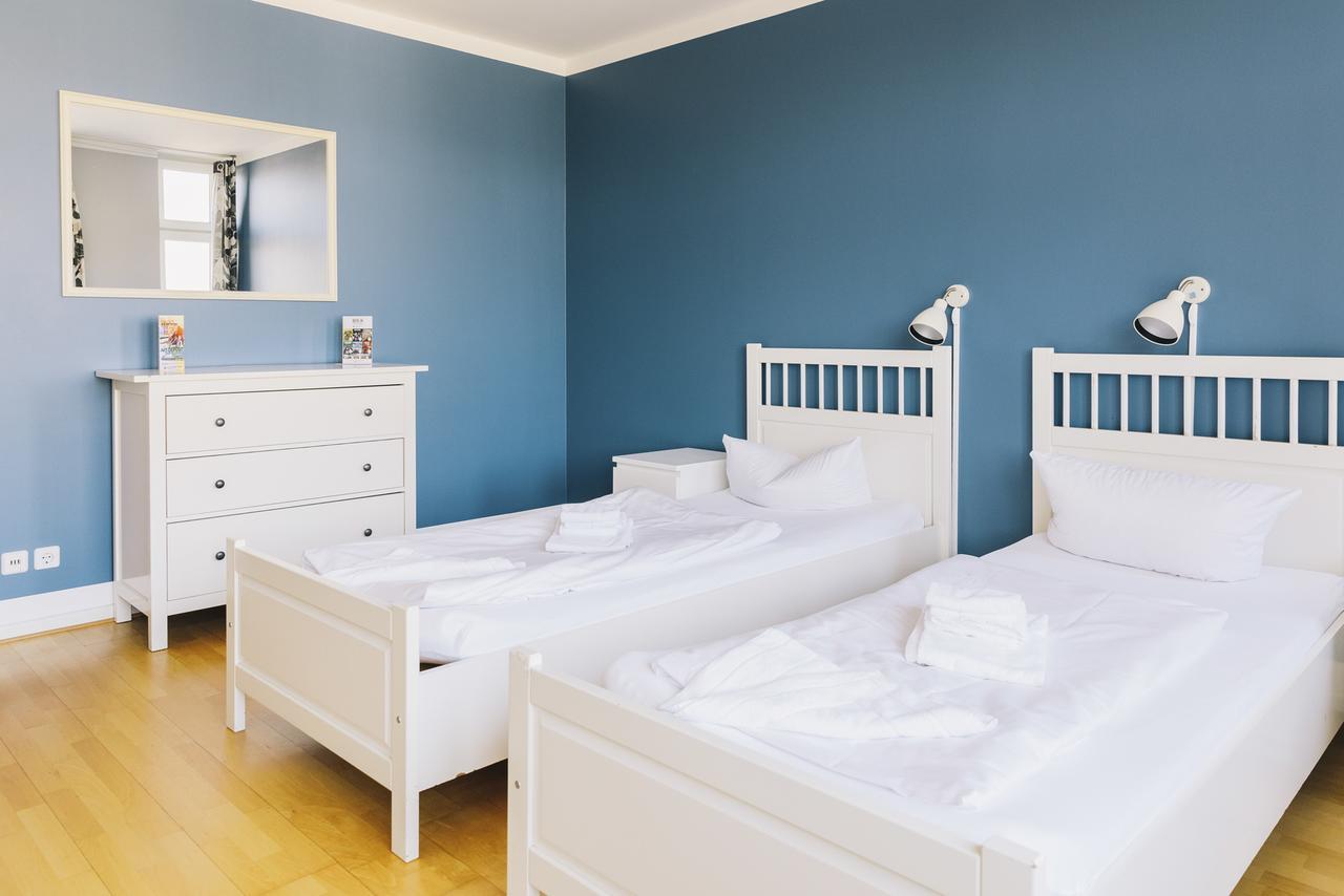 Apartamento con 2 camas individuales y baño compartido