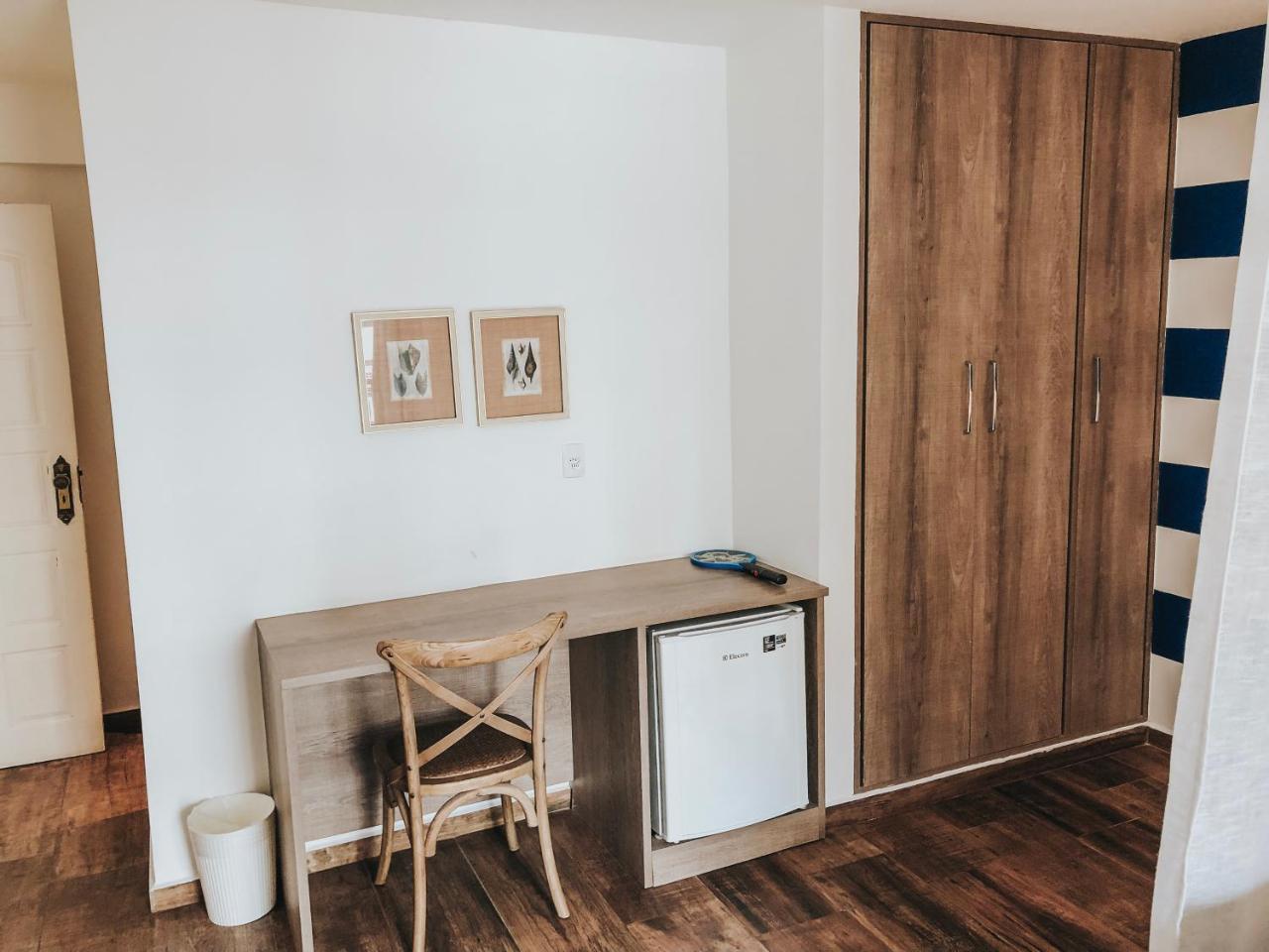 Quarto Quádruplo Premium
